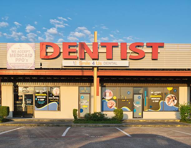 Exterior of Aspen Dental clinic with branded signage showing standardized national dental network presence